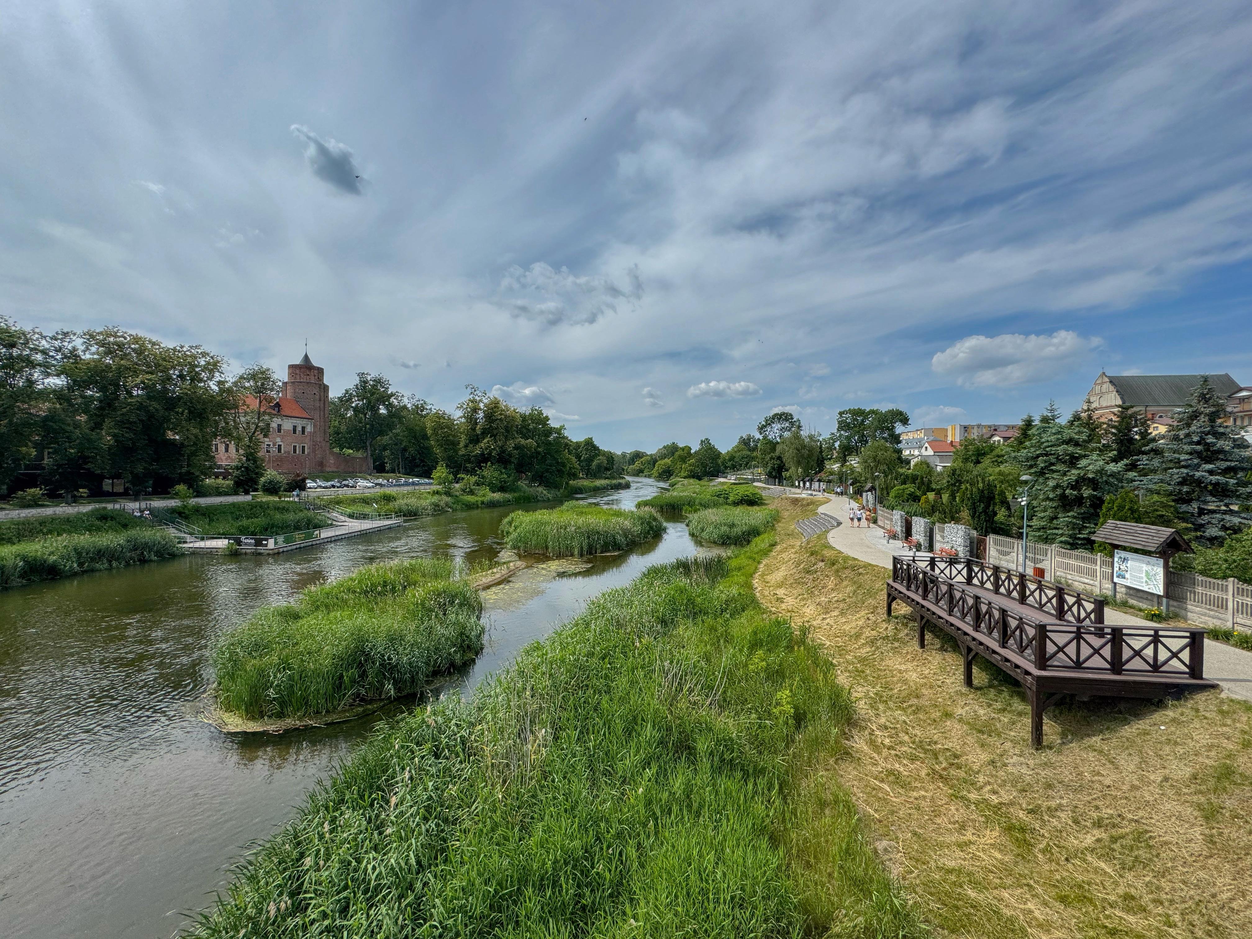 View from a bridge in Uniejów - Warta river and Uniejów Castle.