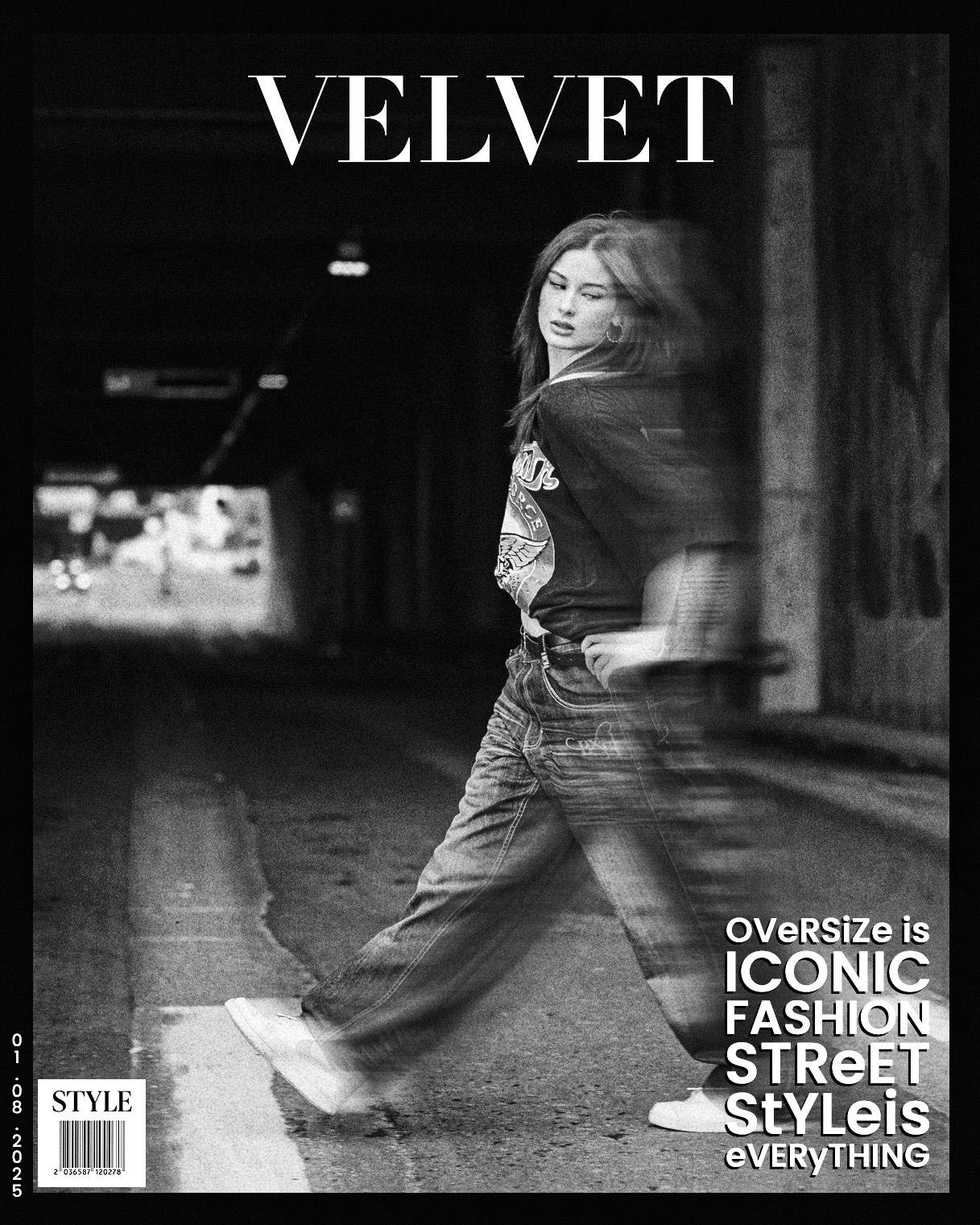 A black and white magazine cover titled "VELVET" featuring a person walking through a tunnel. They are wearing a graphic t-shirt and jeans with blurred motion effect, giving a dynamic feel. The words "OVERSize is ICONIC FASHION STREET STYLe is eVERYTHING" are in bold on the lower right. The date "01 08 2025" is on the bottom left next to a barcode labeled "STYLE".