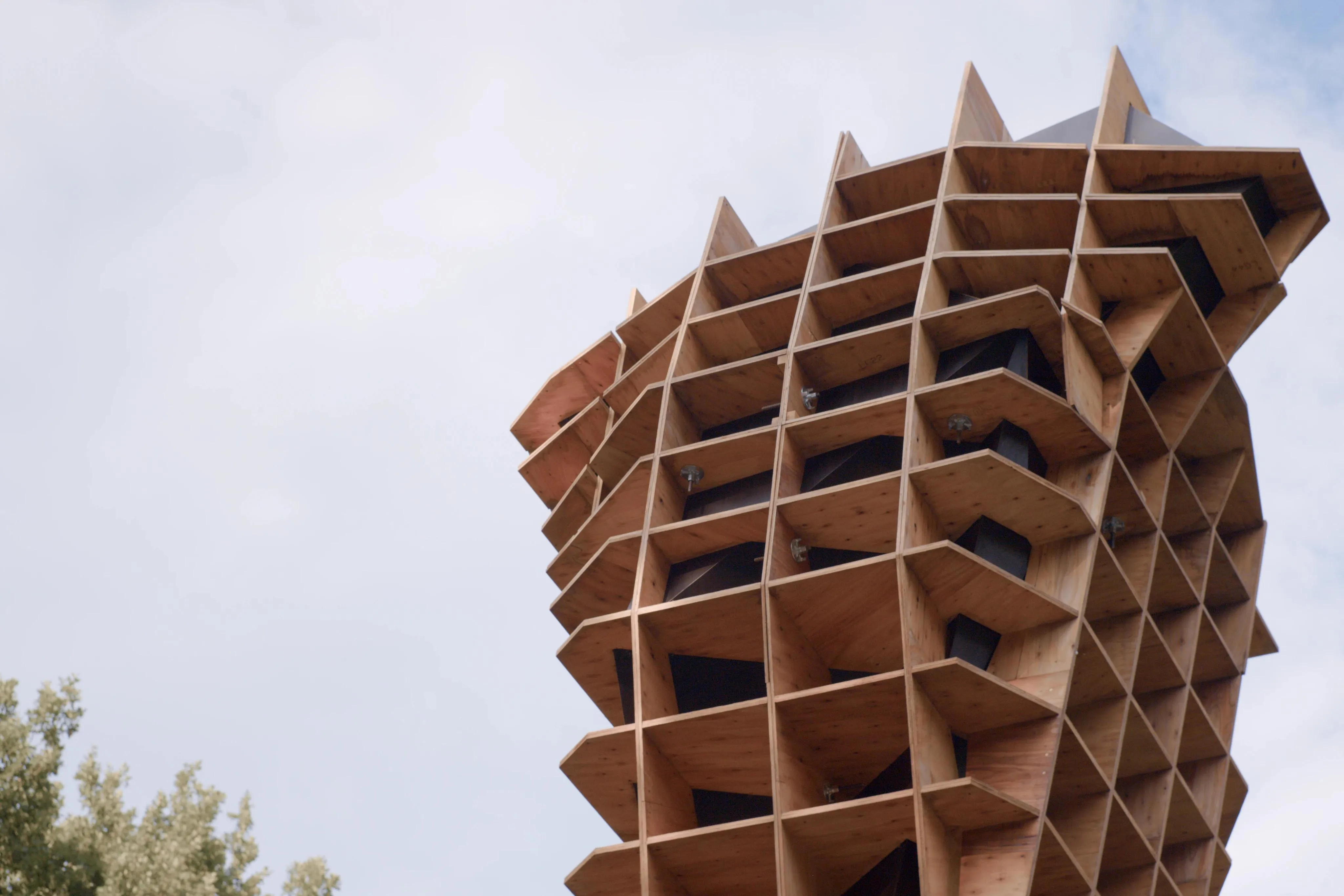 A photo of tall wooden statue