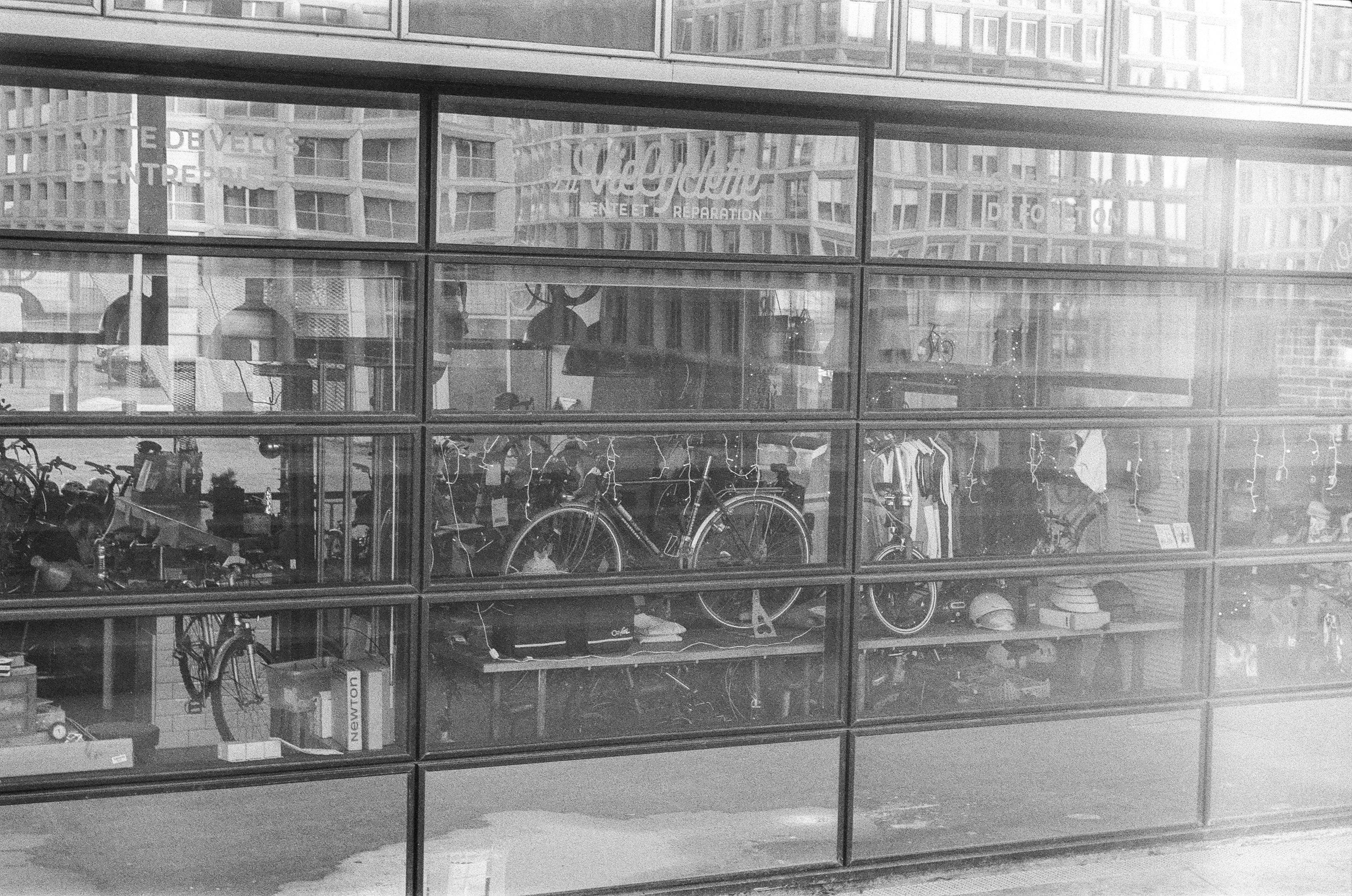 Bicycle store photographed from the outside, through large windows