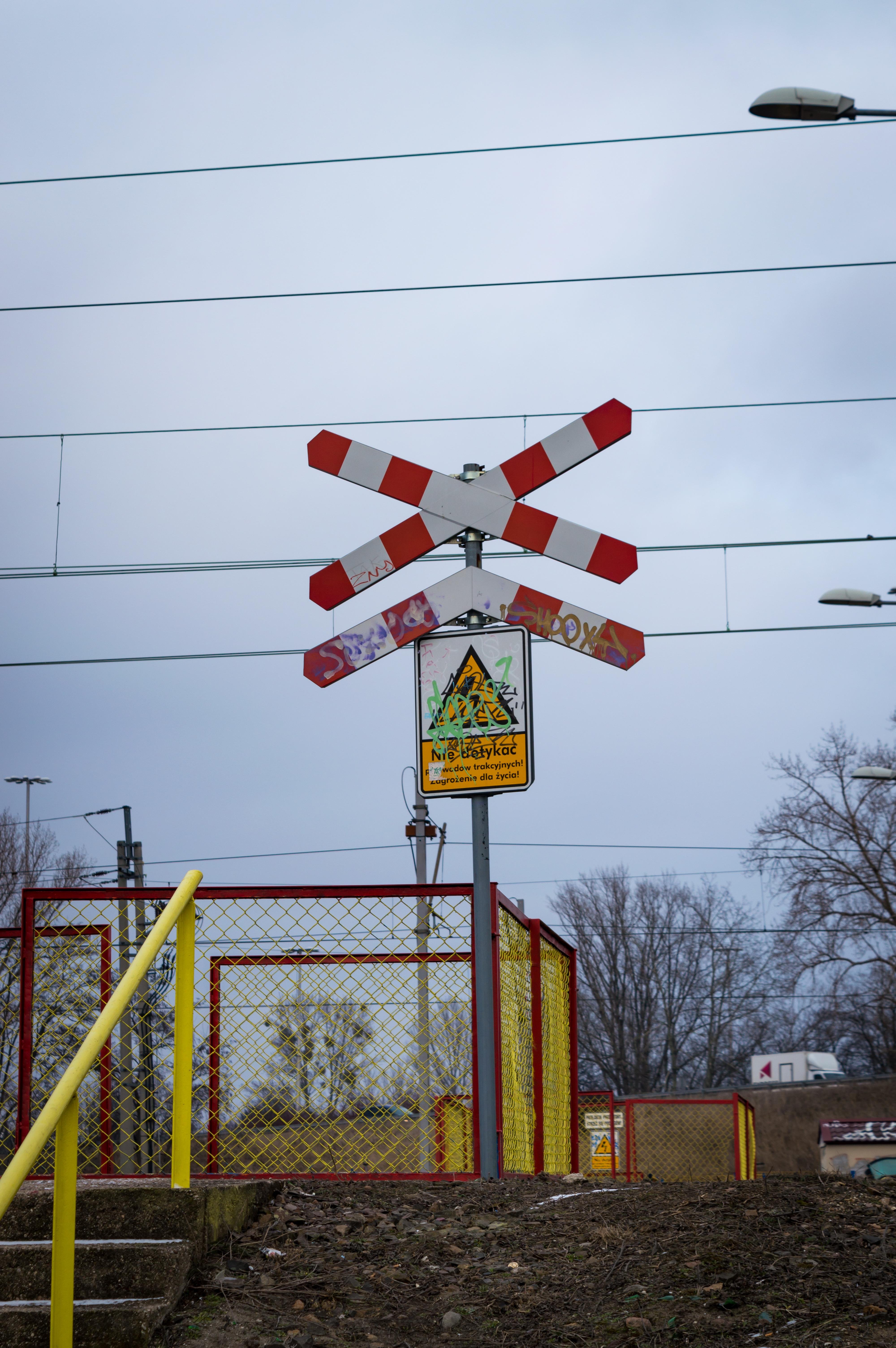 Warning sign of a railway crossing with 2 or more tracks ahead