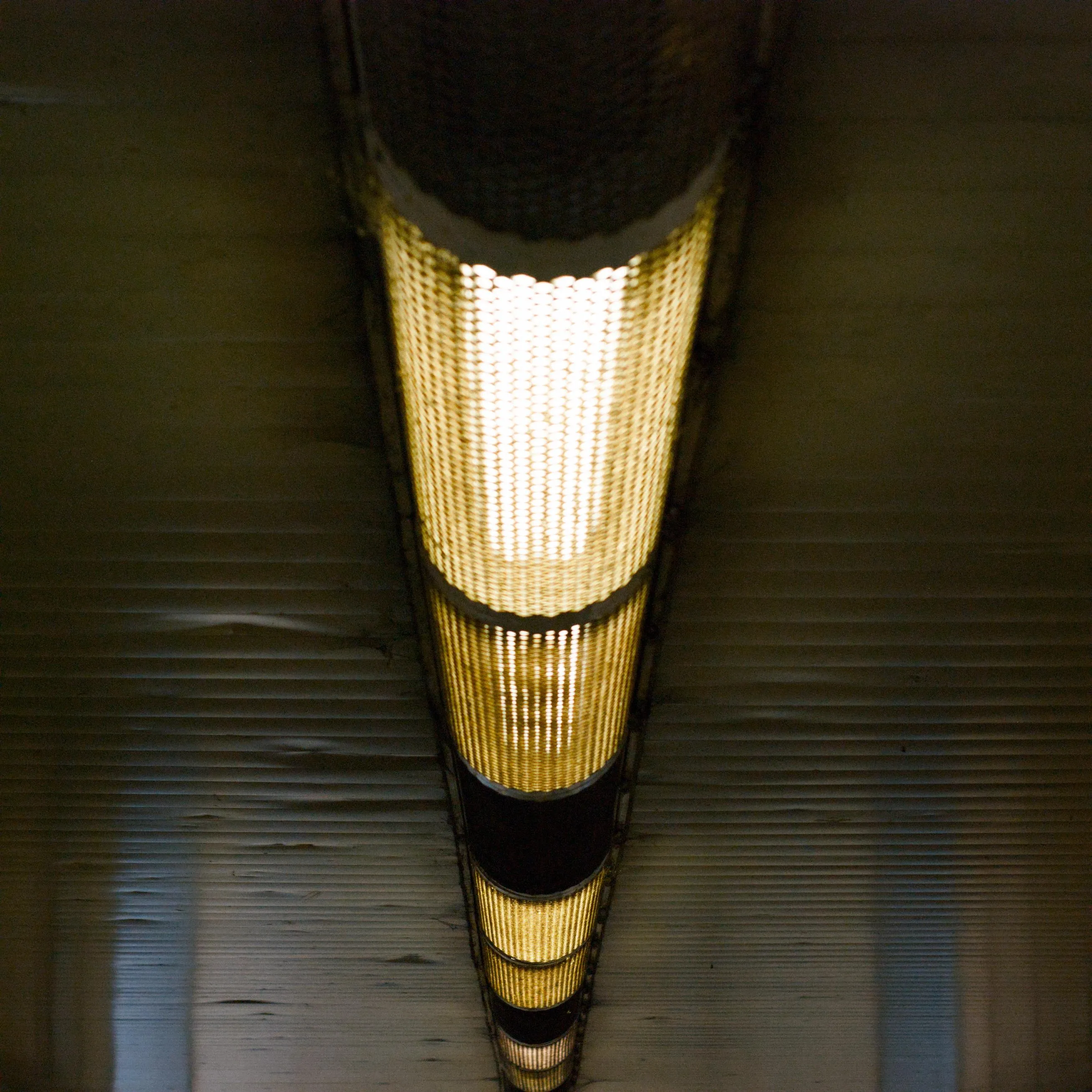 A photo of a fluorescent lamp in an underground tunnel