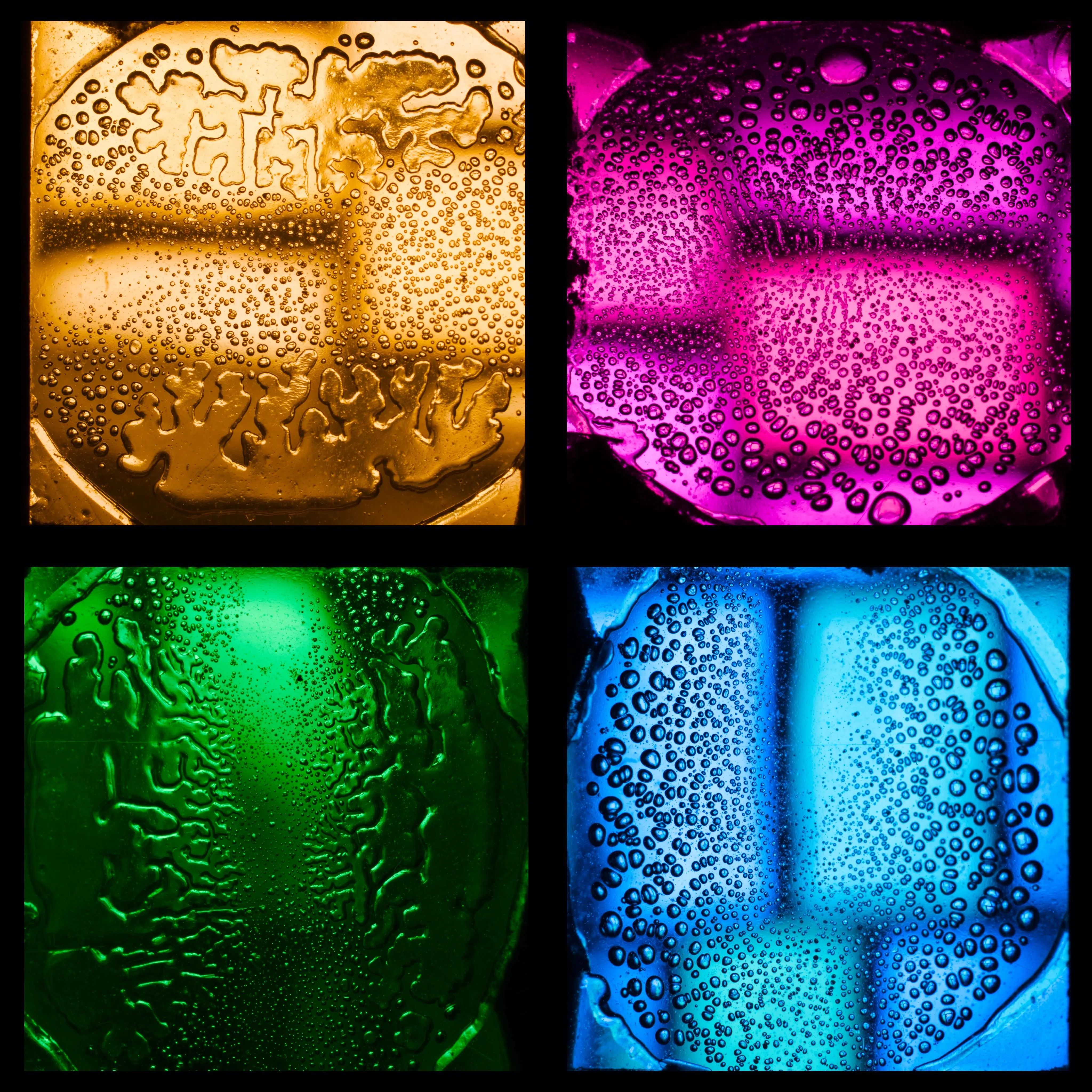 Macro photo of glass and its patterns. The image is divided into four squares. In each square a different photo of the glass lit by different colour light.