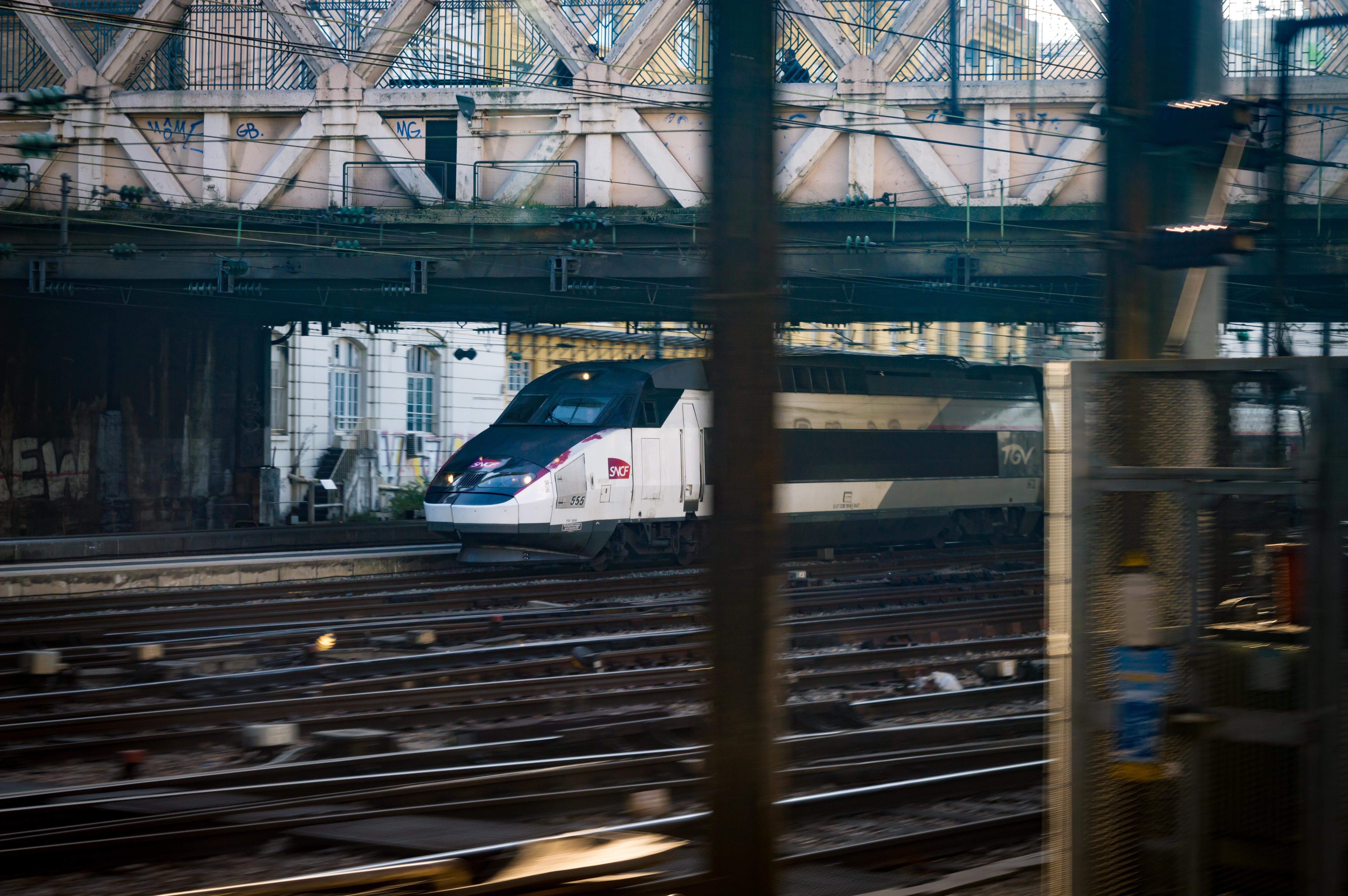 TGV Réseau train in Paris seen through the window of a moving train