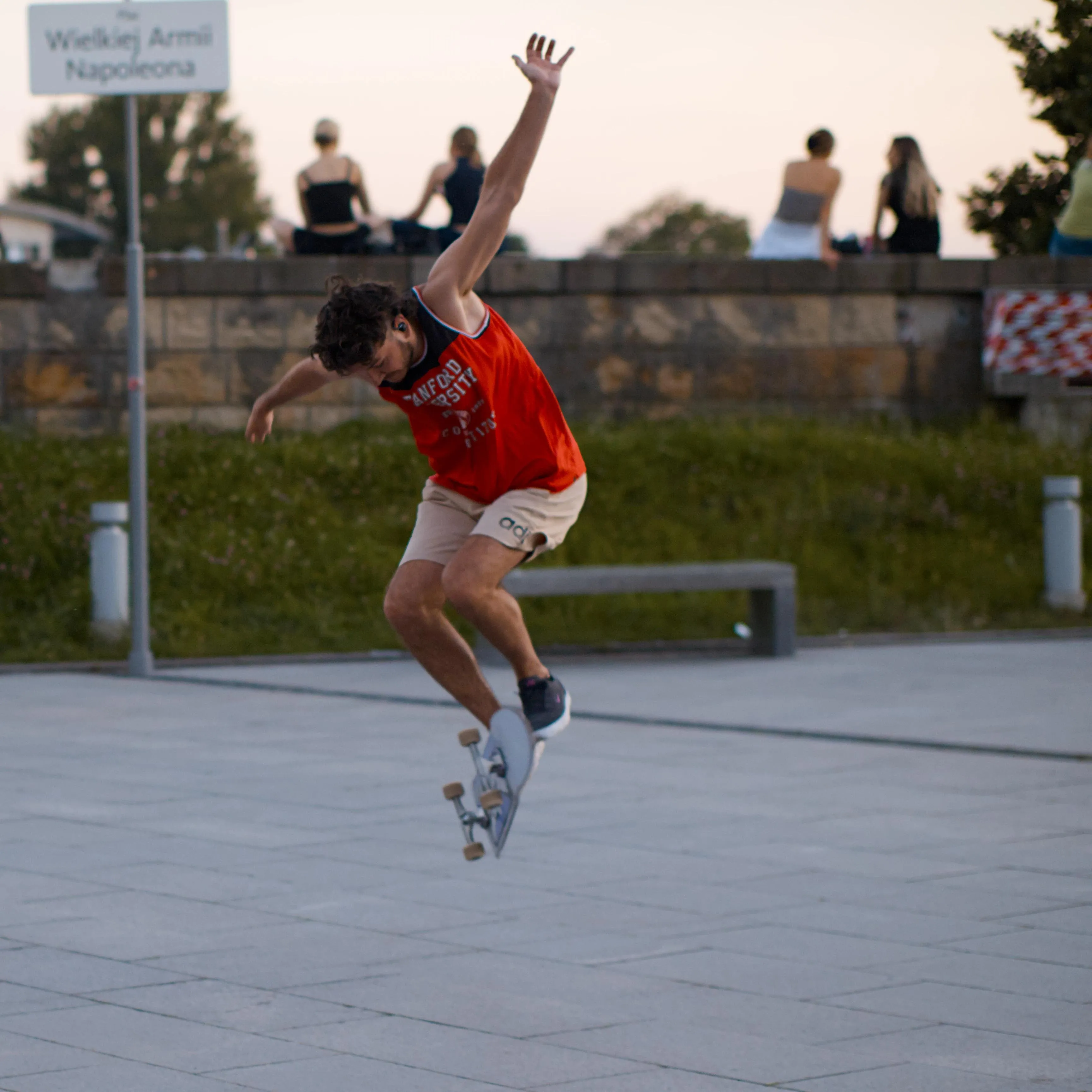 A photo of a person skateboarding in the air